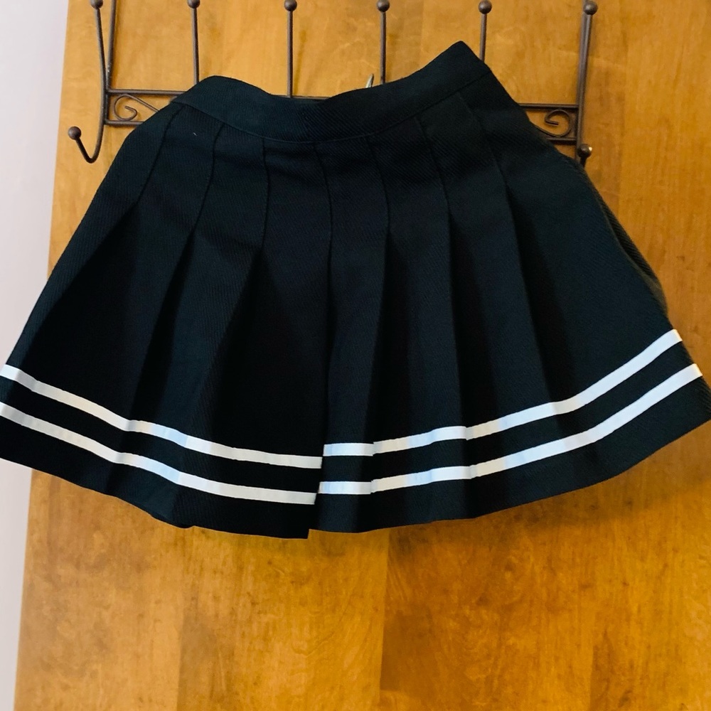 H & M Divided short black pleated skirt.